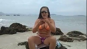 Young latina wife gets naked, dances and teases men on public beach in Brazil - real amateur slut